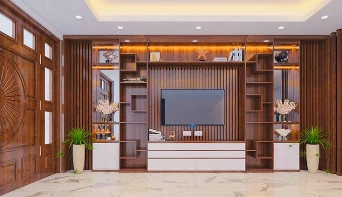 Kệ gỗ âm tường thiết kế tại phòng khách gia đình